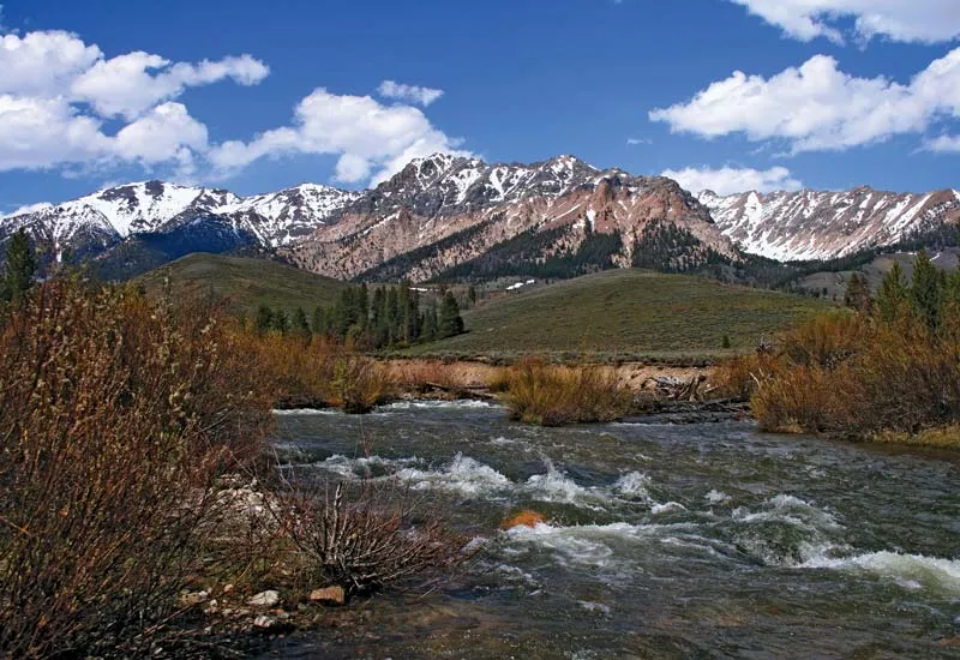 a river flowing through a valley